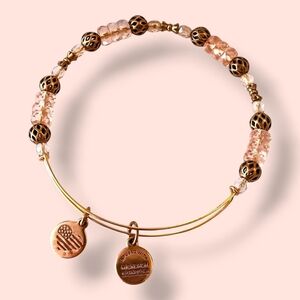 Elegant Gold and Pink Beaded Bracelet